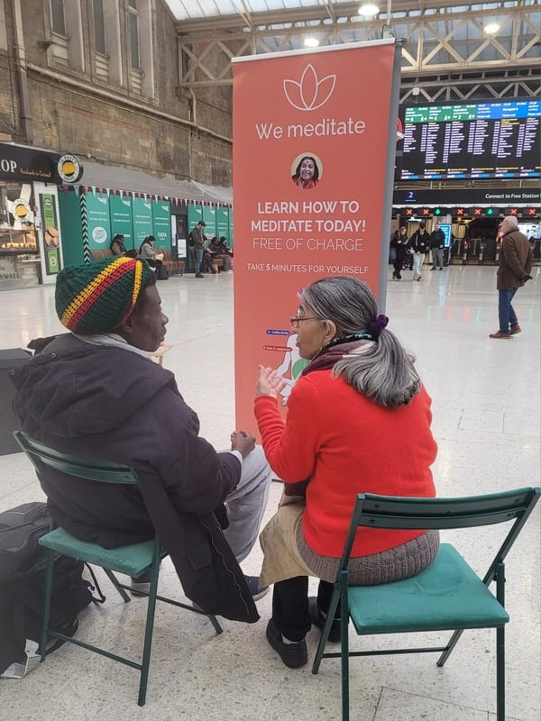 Shri Mataji at a station